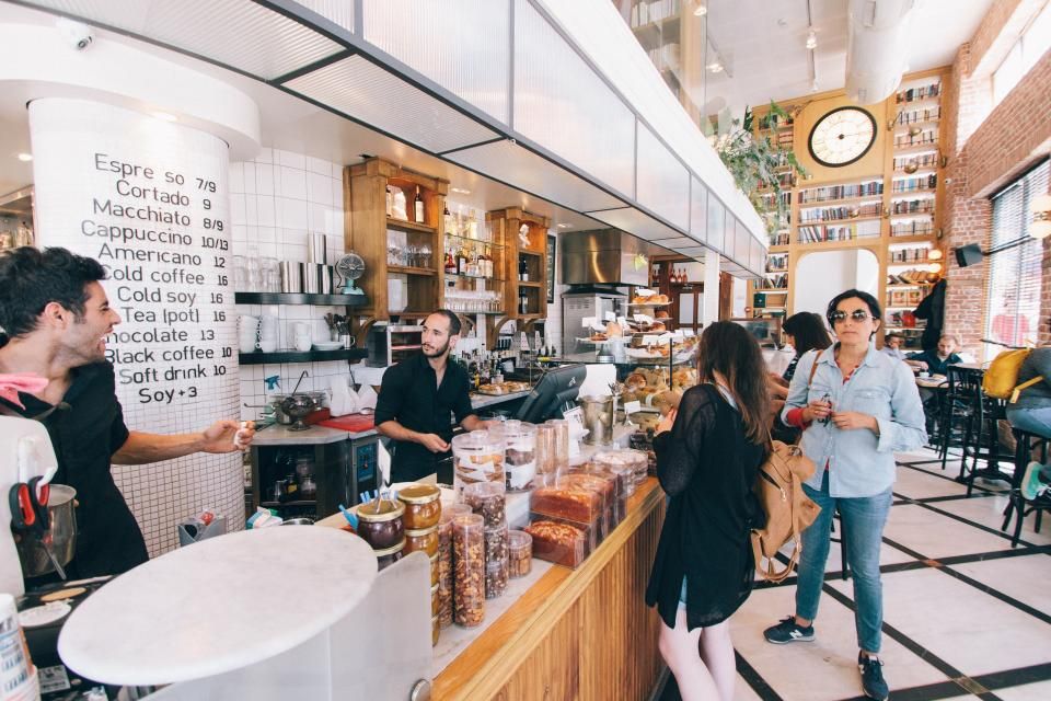 The cafe counter with stools alongside